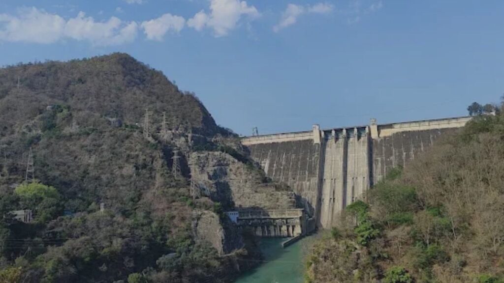 How the Bhakra Nangal Dam Changed North India Forever 2 The dam site at Bhakra Gorge was chosen for its unique natural features. A narrow 518-meter-long, 9.1-meter-wide sandstone gorge provided an ideal foundation. The sandstone bedrock’s strength and low permeability minimized seepage risks and reduced construction complexity.